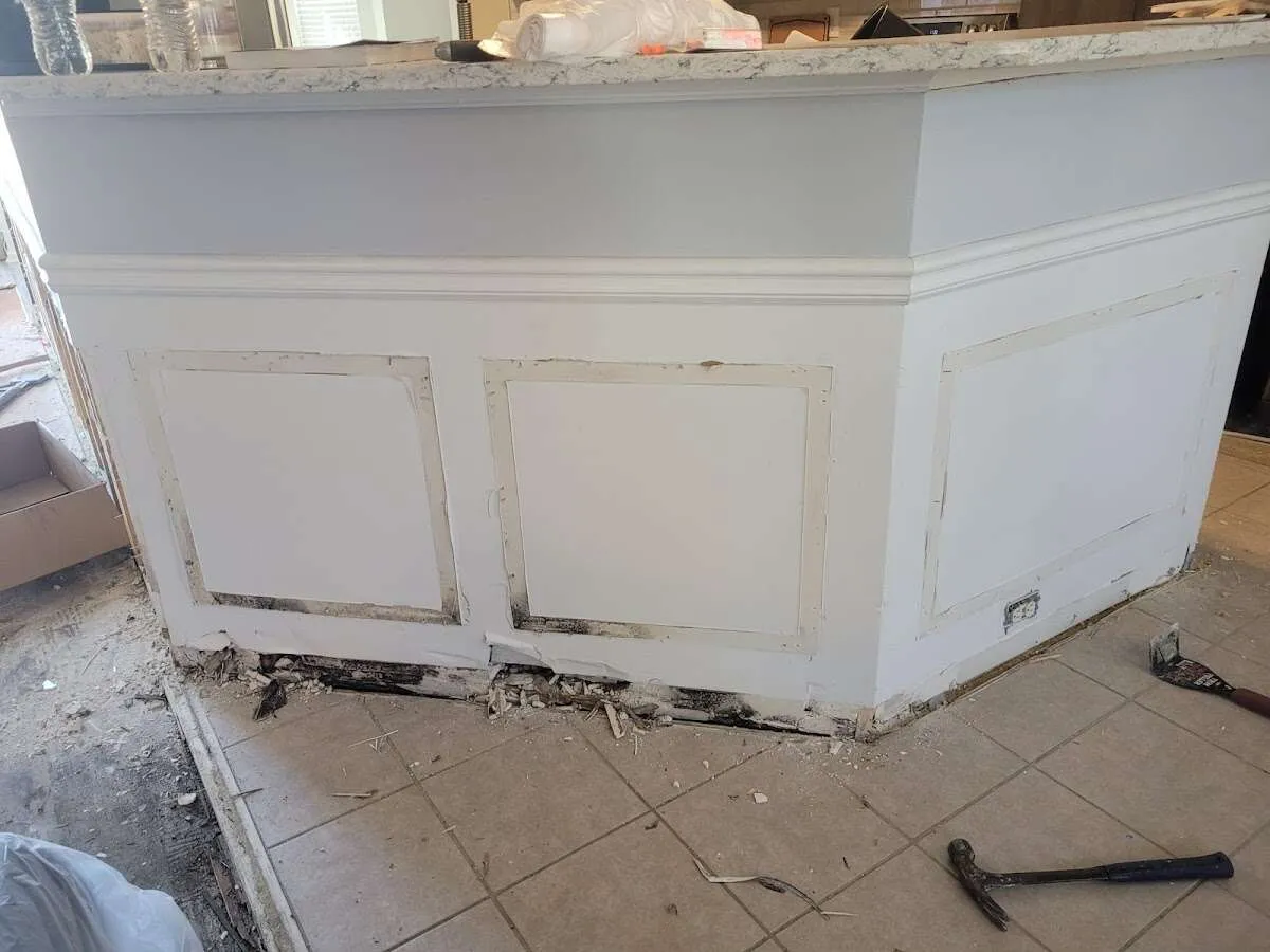 Water damage and mold on kitchen during Sewage Cleanup & Sanitation in Temple City